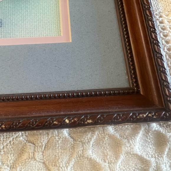 Custom framed Teddy Bear Cross Stitch with Floral Accents 1998. 19.5” x 23.25”